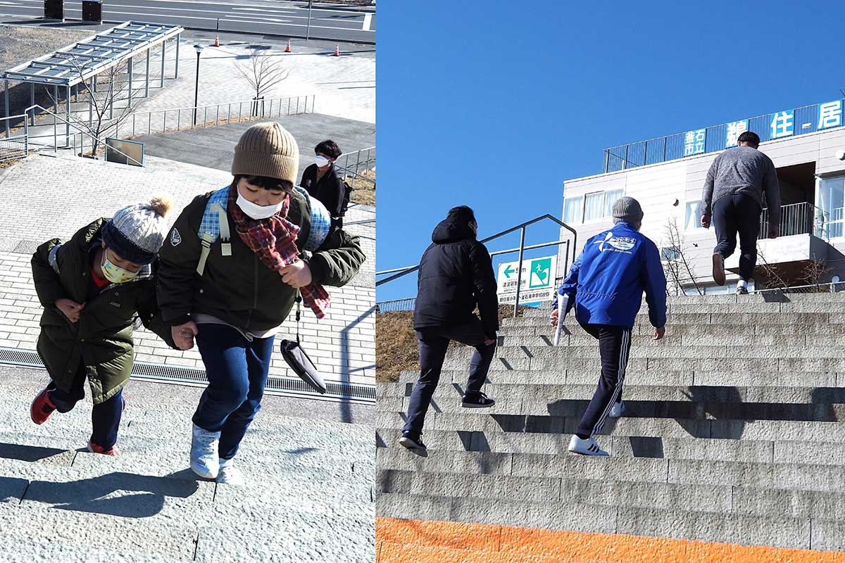 子どもも大人も鵜住居小・釜石東中校庭を目指し階段を駆け上がった