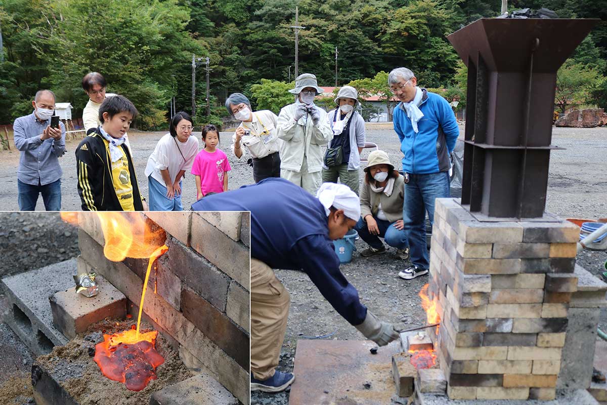 炉から流れ出るノロ（不純物）に興味津々の参加者＝「餅鉄で鉄瓶を作ろう」第2弾