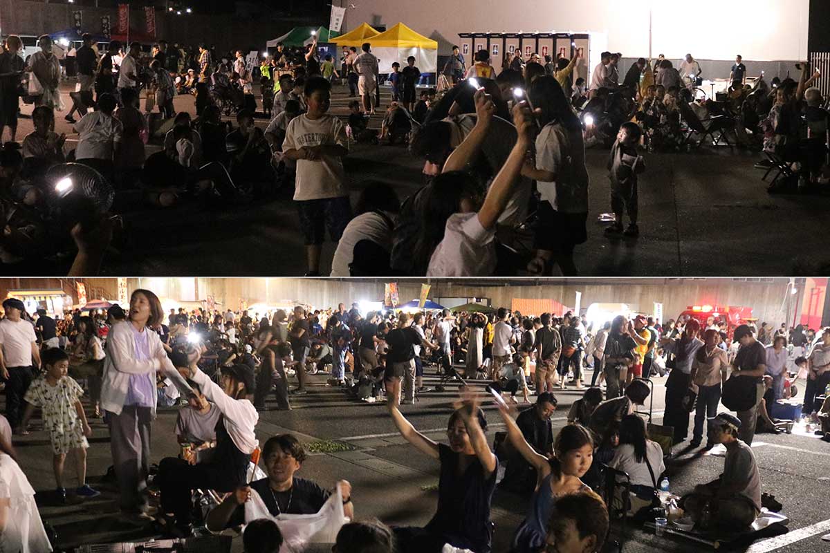 花火打ち上げ終了後、ライトを点灯したスマホを振って花火師に感謝を伝える観客