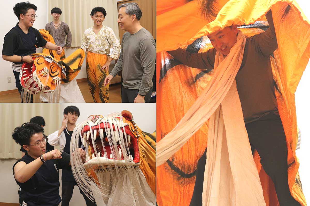 外国人客は虎頭や幕の動かし方を教わって踊り体験