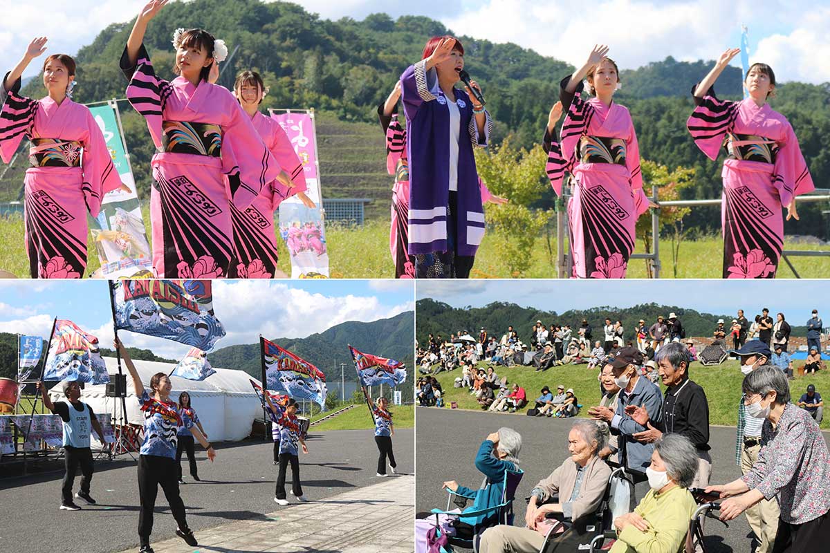 佐野よりこさんが歌う「釜石小唄」に踊りで華を添えるよいさ小町(上)。ステージ前では「ちあ釜」のフラッグパフォーマンスも(左下)