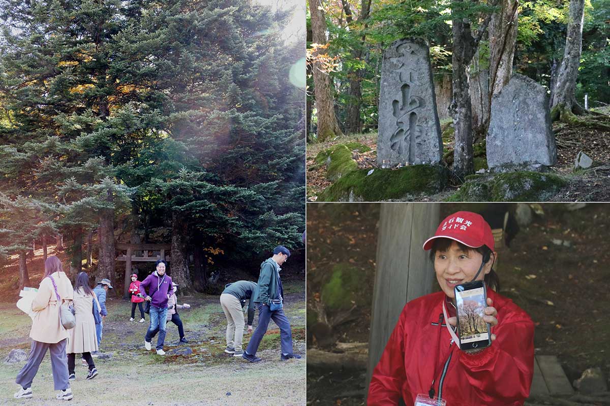 エリア内には山神社跡も。山の斜面には石碑が残る(右上)。案内したガイドは春に“石割桜”が花を咲かせる写真も見せた(右下)