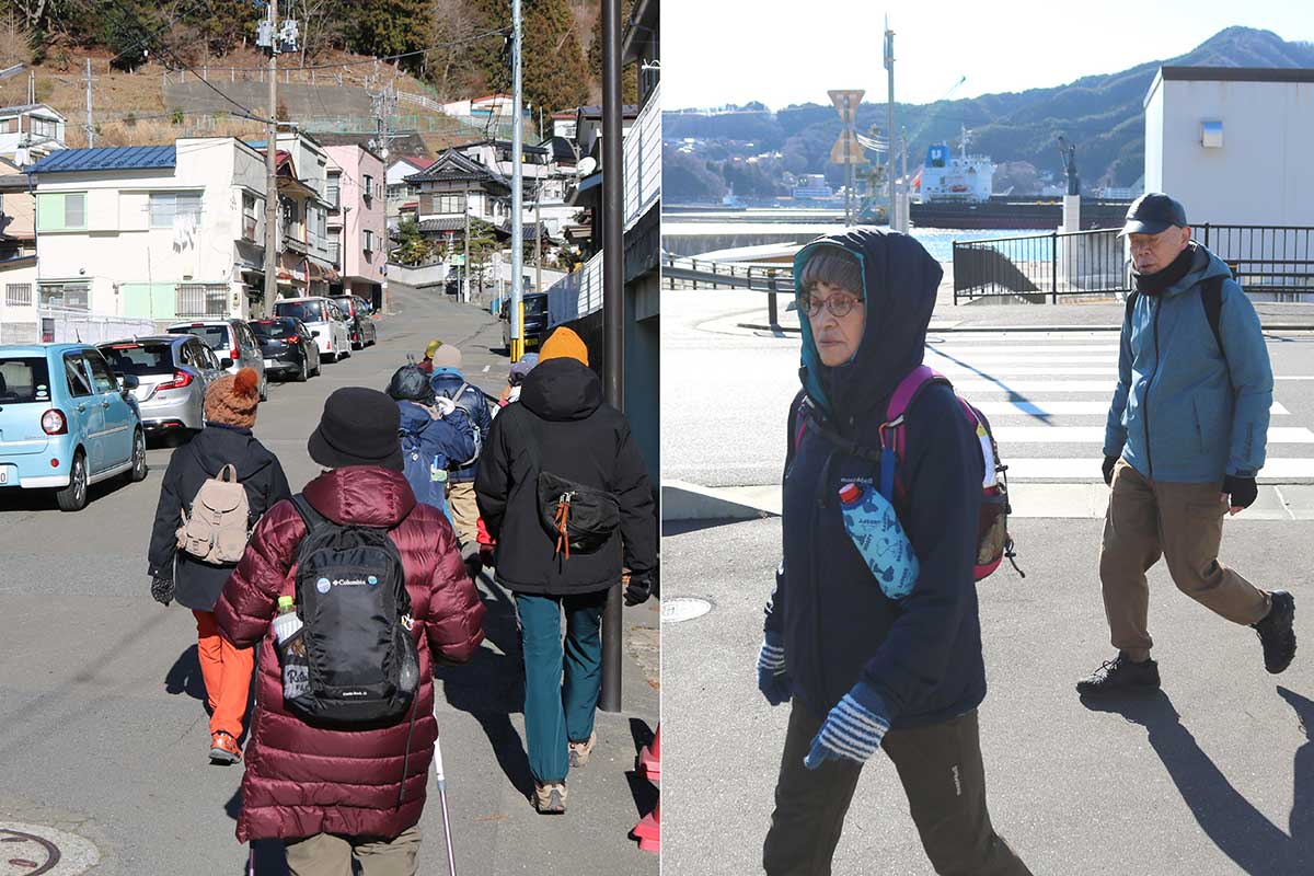 釜石港を臨む浜町に到着。ゴールの尾崎神社まであと少し。初詣に向かう車列も続く(左)