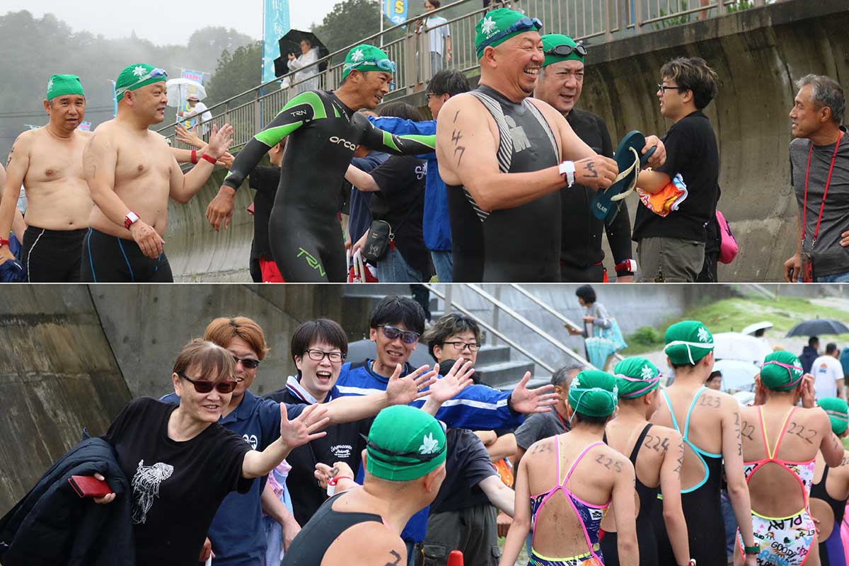 スタート地点に向かう1キロの部の選手をハイタッチで激励
