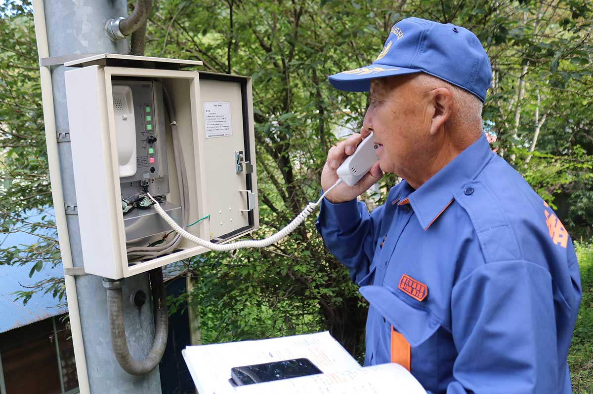 小川川の水位上昇の連絡を受け、防災無線で住民に避難を呼びかける